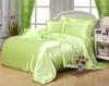 Red Wedding Four-Piece Set: Imitation Mulberry Silk Duvet Cover and Bed Sheet in Solid Color, Double Size, Faux Tencel Tribute Satin.
