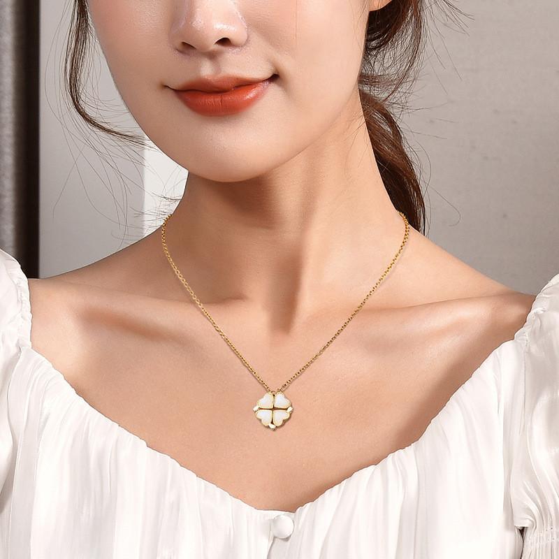 Captivating Titanium Steel Four Leaf Clover Heart Necklace Enhanced With Gold For A Dazzling Look