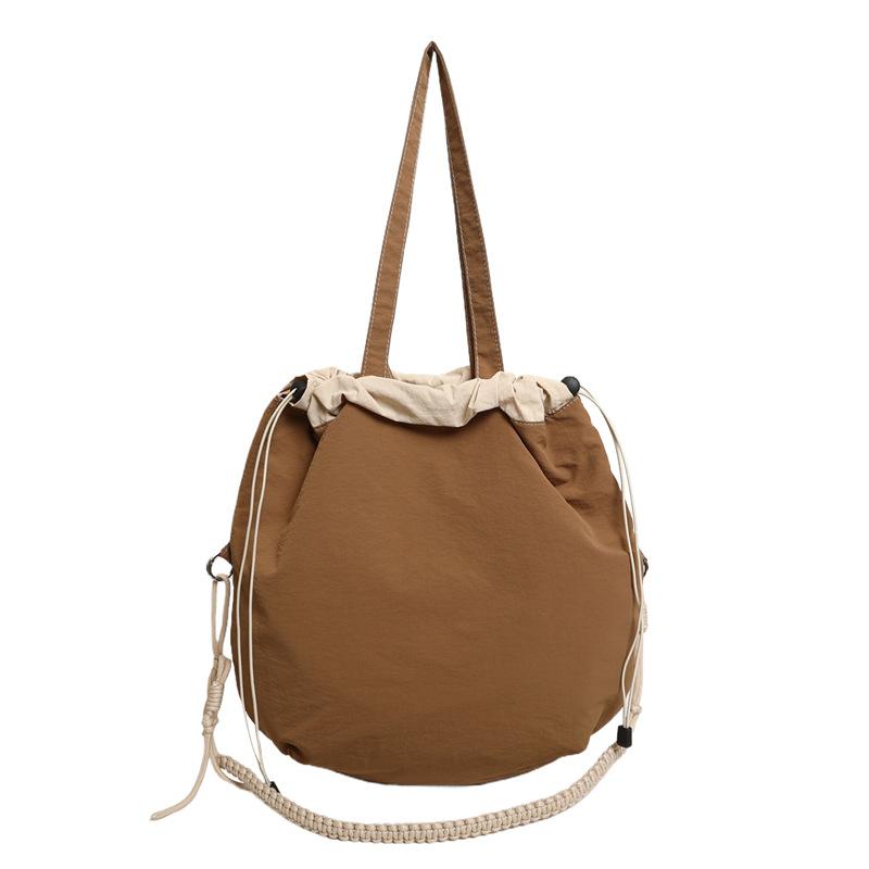 

Contrasting color casual handbag Large capacity folding bucket bag Small fresh drawstring bundle single shoulder women s bag average size