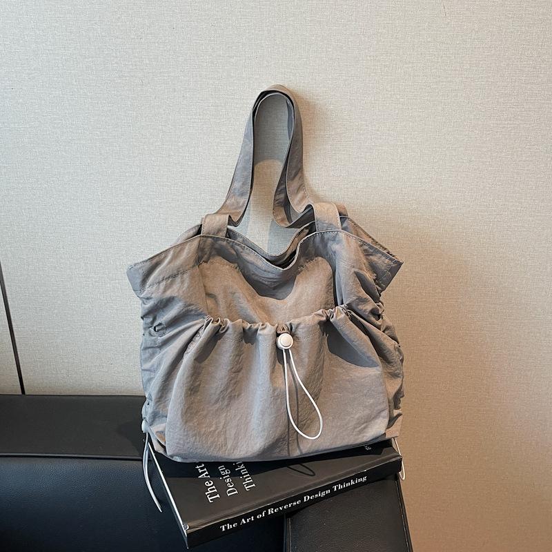 Große Tote Bag Trendige Lässige und Leichte Pendlertasche Einzelne Schulter Kordelzug Damen Tasche