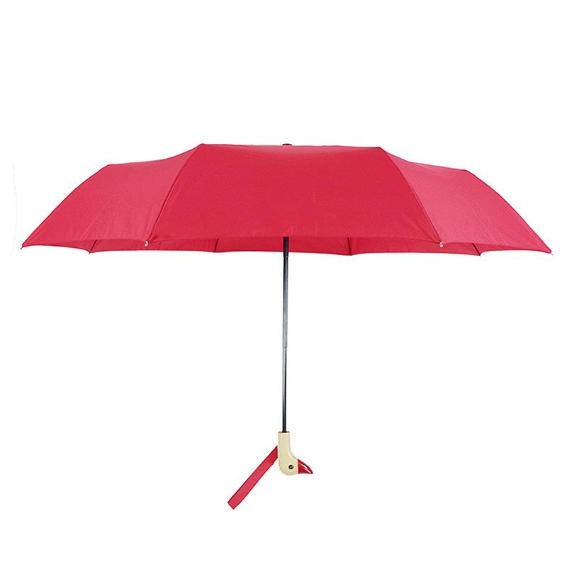 Cute Three-Fold Duck Head Umbrella: Cartoon Design, Wooden Handle, Solid Color for Rain or Shine.