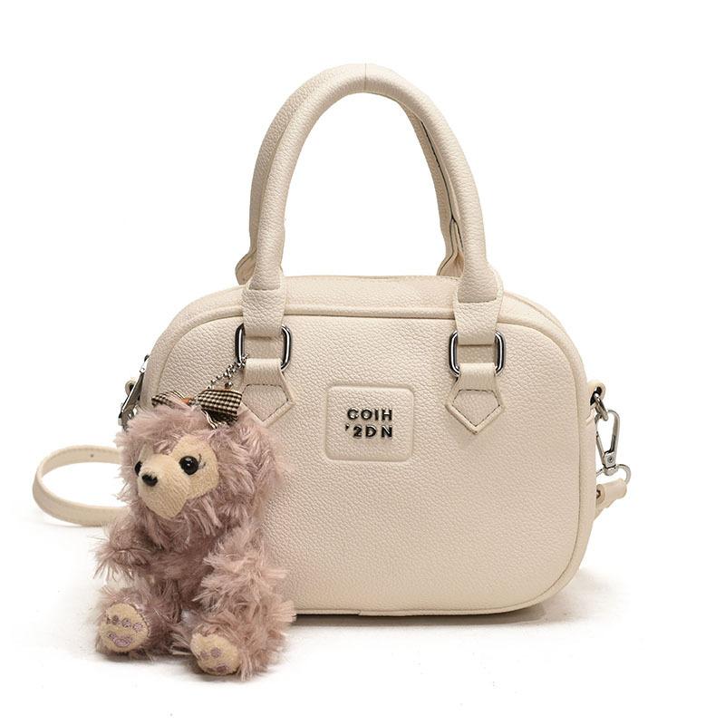 Early Spring Hot Sale French Niche Fashionable Portable Bowling Bag Solid Color Versatile Temperament Advanced Sense Messenger Women's Bag