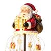 Solar Powered Winter Garden Accents Santa Claus Christmas Light, LED Holding Gift Box Yard Stake Holiday Lawn Stakes for with Cascading String Lights