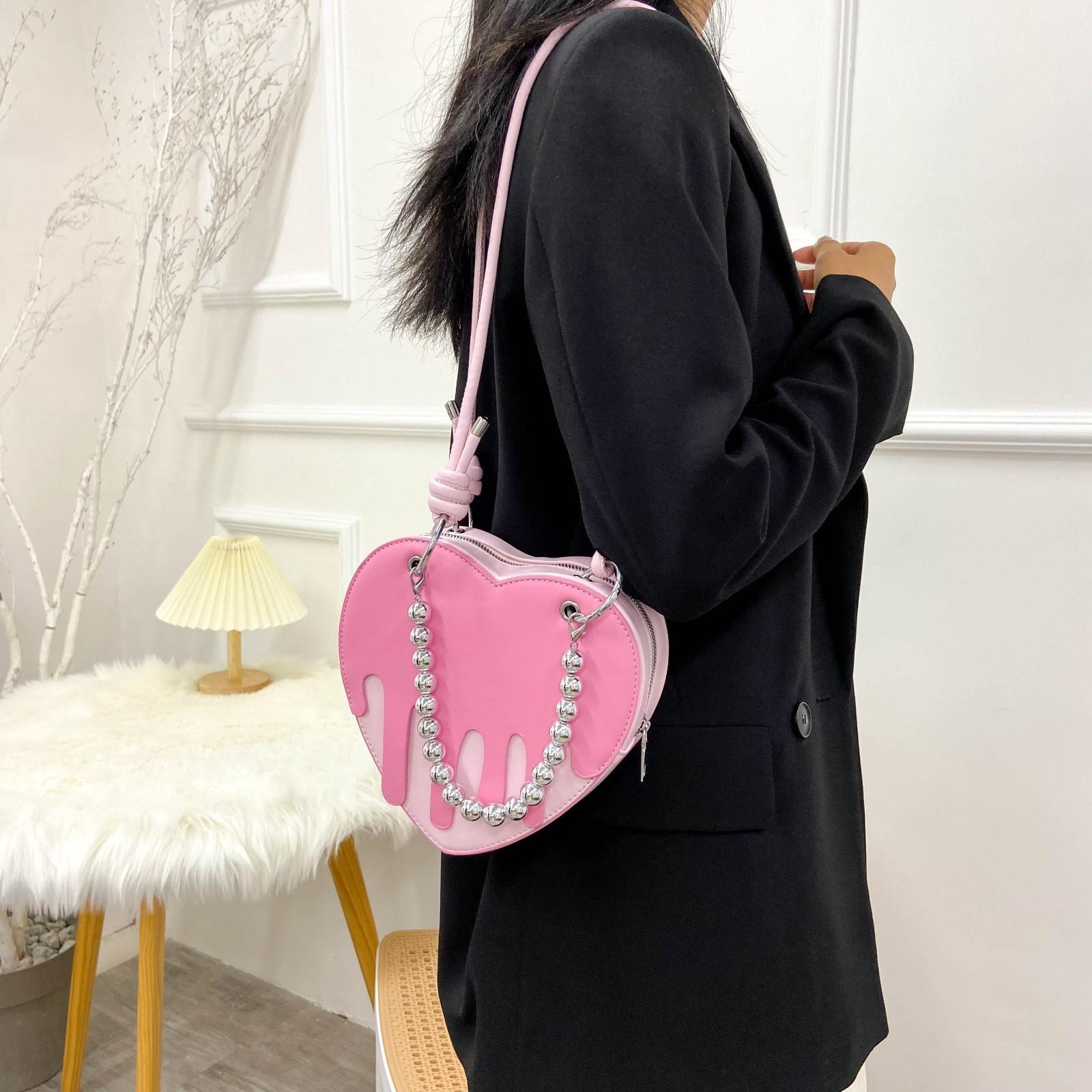 

Peach heart bag women s 2025 new love bag niche creative Japanese and Korean foreign style portable shoulder messenger bag розовый