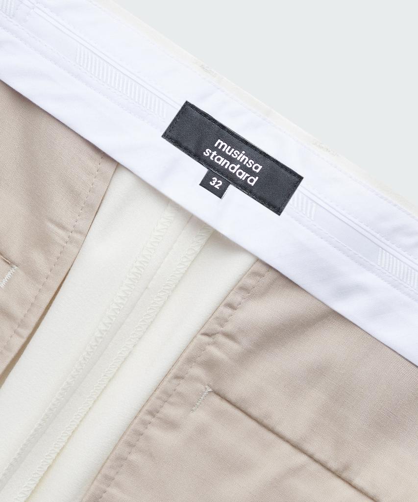 Musinsa Standard Lightweight Tapered Hidden Banding Crop Slacks [Cream]