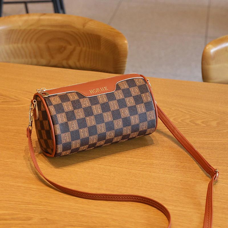 

Cylinder bag women s new summer fashion checkerboard printed letters shoulder crossbody small round bag темно-коричневого