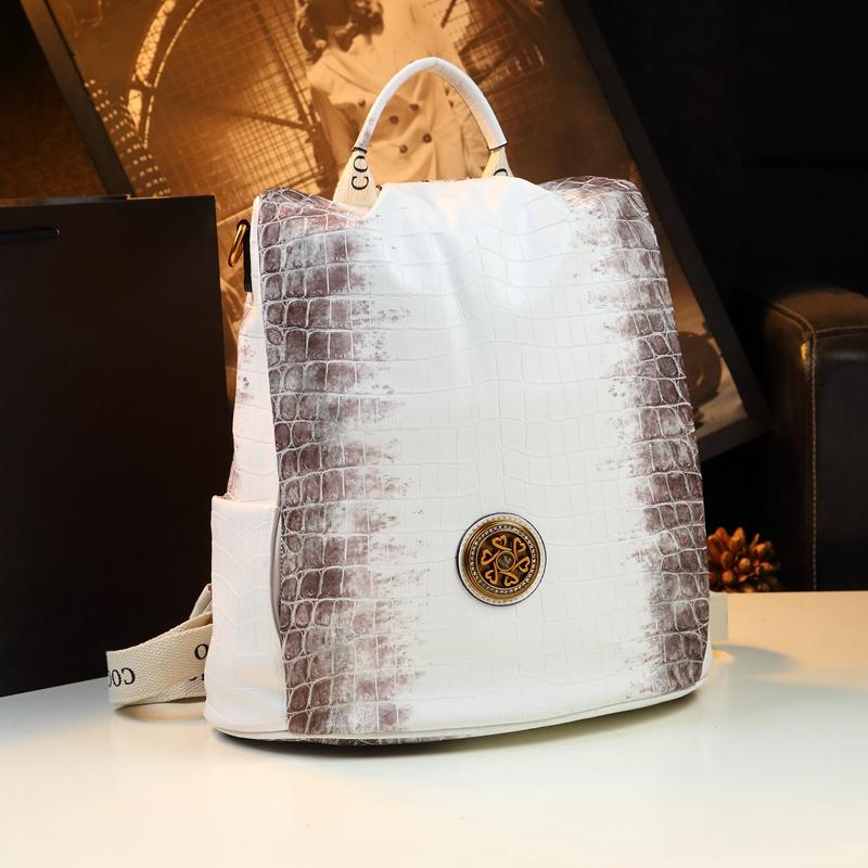 

Белый кожаный рюкзак женский под крокодила 2024 новый большой вместимости для поездок и работы многофункциональный наплечный школьный белый