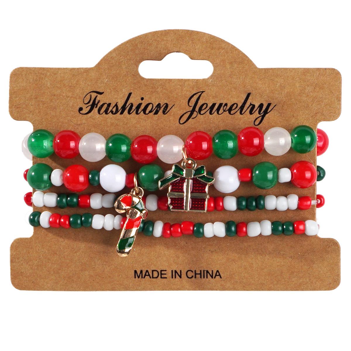 

Festive Layered Bracelet: Beaded with Snowman, Christmas Tree, Santa, and Reindeer Antlers Charms