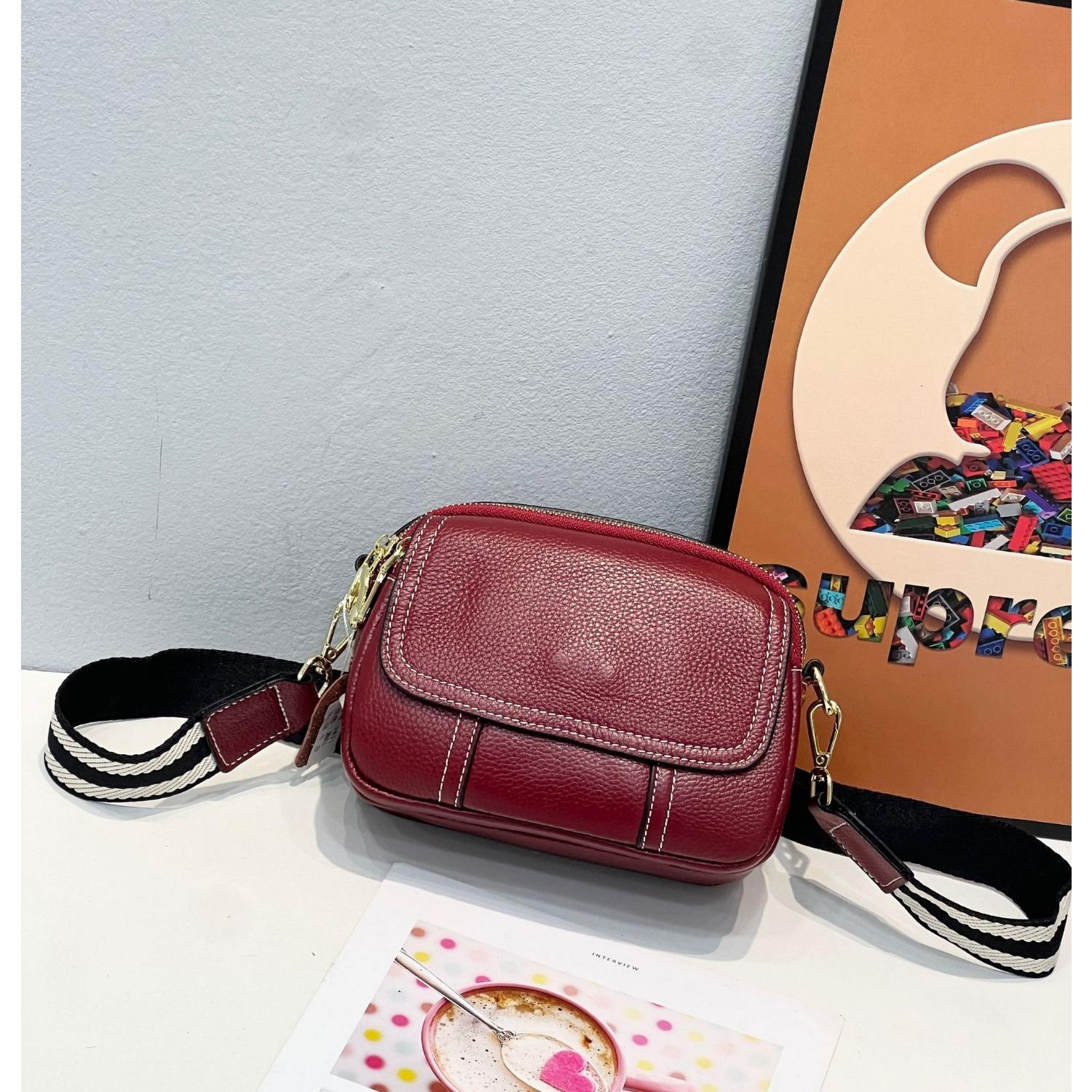 

Женская портативная сумка через плечо из коровьей кожи, простая модная сумка, нишевый дизайн, круглая сумка бордовый