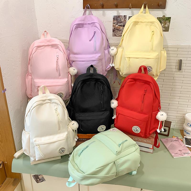 College student schoolbag women's simple solid color large capacity travelhigh school student computer bag Korean version high school student backpack