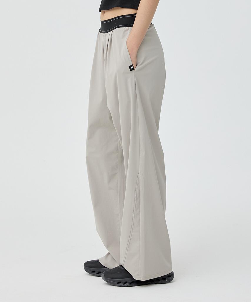 Chaebteoegseu Curved Line Cooling Wide Trousers (Beige)