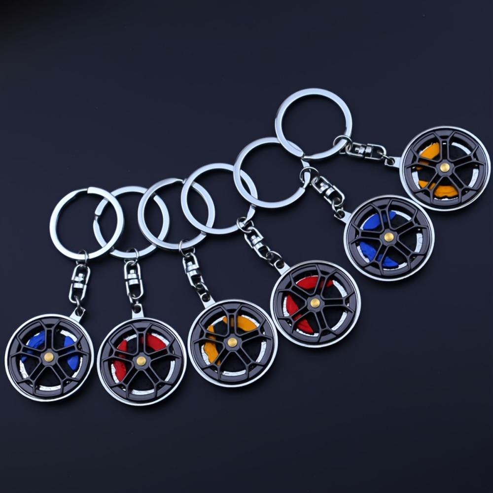 Metallbremsradnabe drehen integrierte Pistole schwarzer Schlüsselanhänger Weihnachtsgeschenk Mercedes-Benz Radnaben-Bremssattel-Schlüsselanhänger