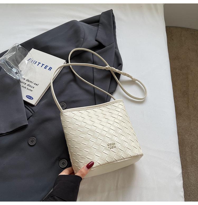 

2025 summer new tote bag women s woven pattern bag niche design fashion versatile bucket shoulder messenger bag