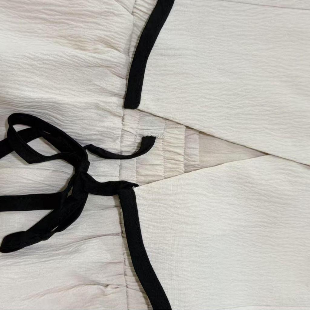 2025 European & American Women's Slimming Two-Piece Set: Sleeveless Top & Drawstring Wide-Leg Pants