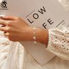 ORSA JEWELS Dainty Conch Shell Bracelet 925 Sterling Silver Ocean-Inspired Beach Jewelry Gift for Women Shell Link Chain GPB41