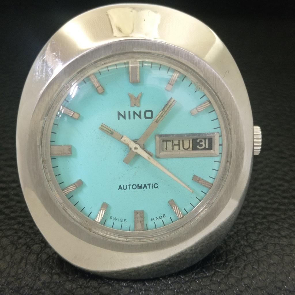 VINTAGE NINO AUTOMATIC 2066 SWISS MENS SEA GREEN COLOR DIAL WATCH a703032-1