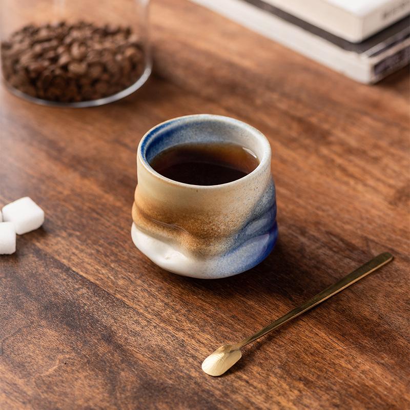 Tasse à café en poterie grossière changement ligne différente créative pincée à la main haut niveau d'apparence tasse en céramique rétro tasse à eau ménagère