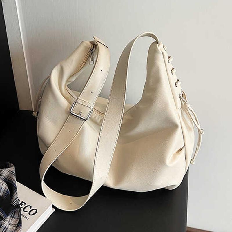 Velkokapacitní dámská crossbody kabelka Nové trendy kabelky s širokým popruhem přes rameno Jednobarevná cestovní kabelka přes rameno z PU kůže