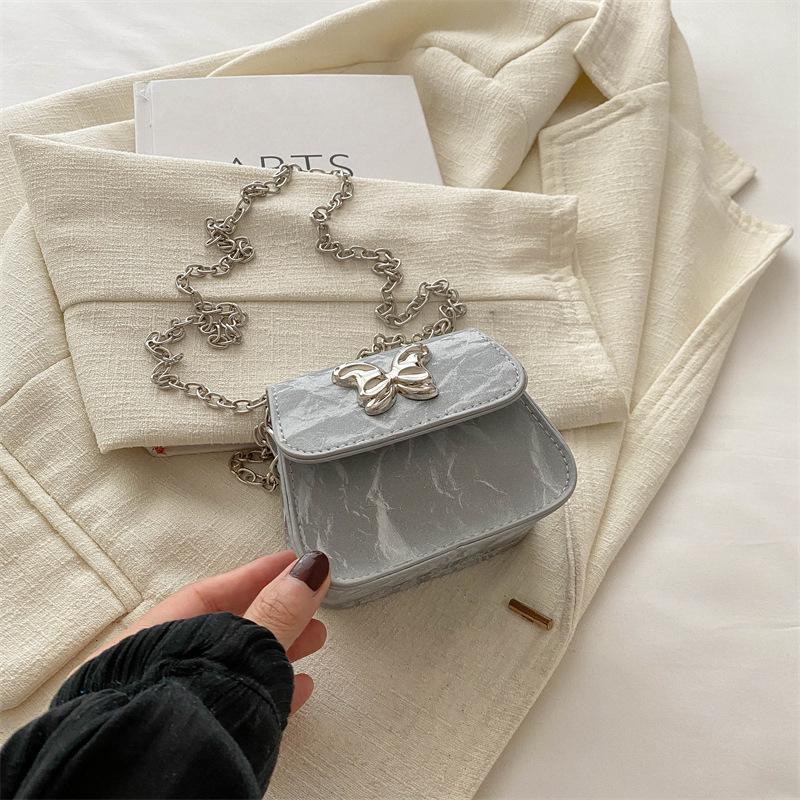 

Internet celebrity mini butterfly chain small bag women 2025 summer new versatile foreign style shoulder messenger bag change bag серебряный