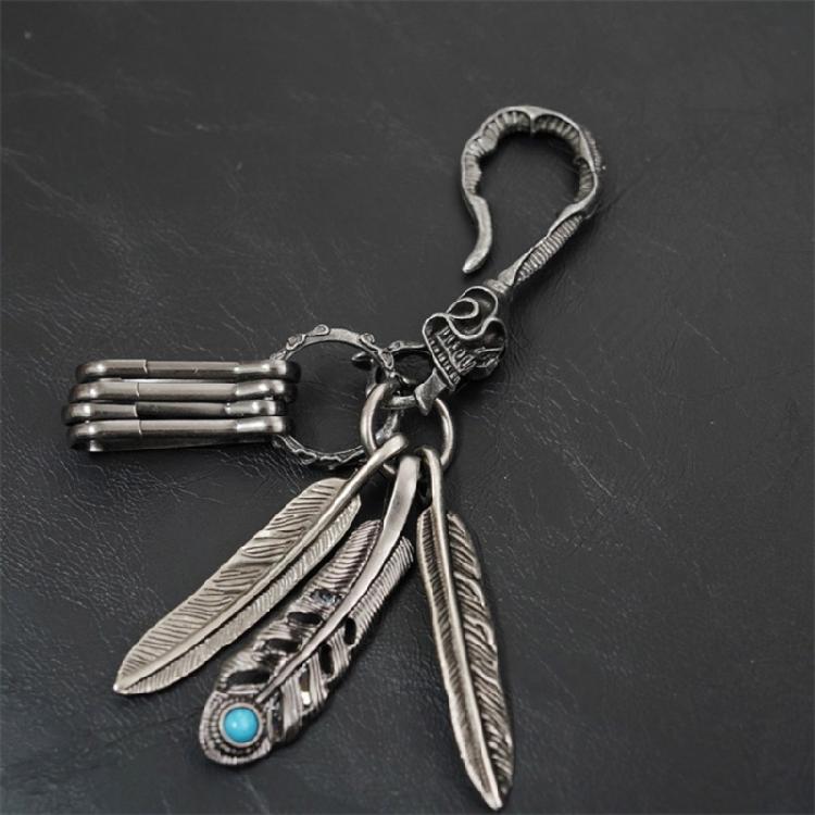 Distinctive Feather Keychain Charm In Antique Silver With Turquoise for Individualistic Fashion Statements Pieces