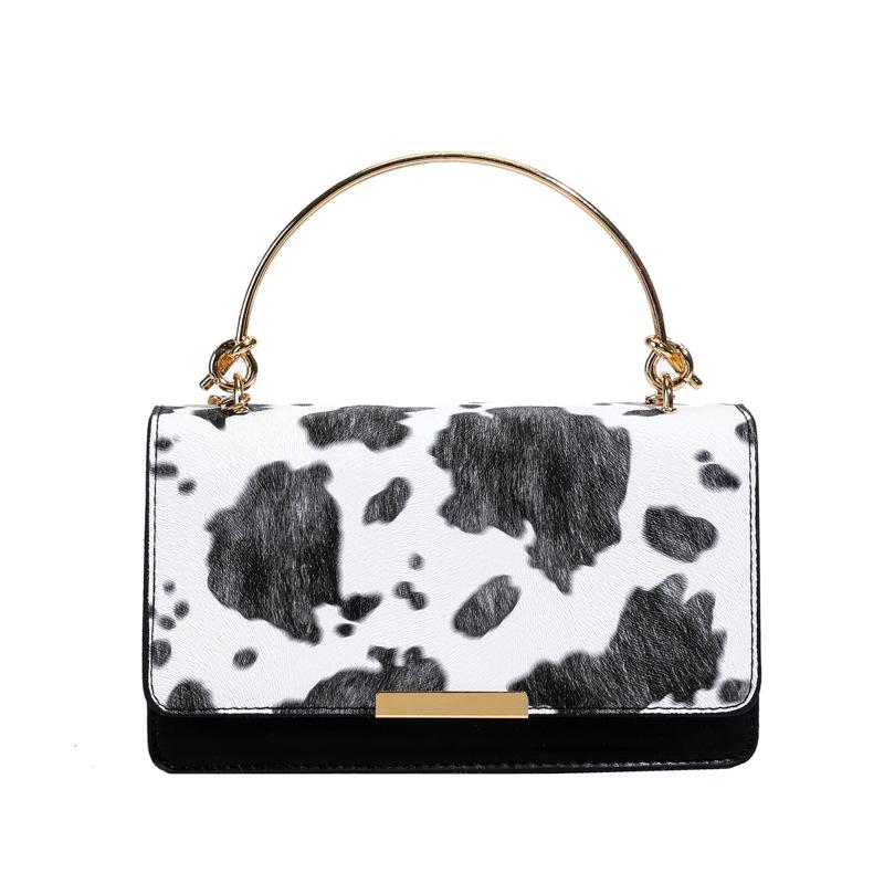 

European and American retro fashion cow pattern handbag bag women s summer new texture commuter shoulder oblique span bag чёрный