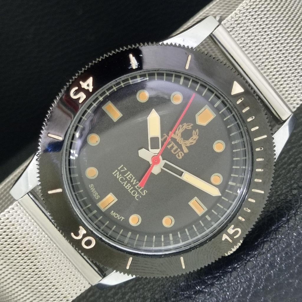 

SWISS VINTAGE TITUS HAND-WINDING MENS TURNABLE BEZEL BLACK DIAL WATCH a700253-5 R202-a700253