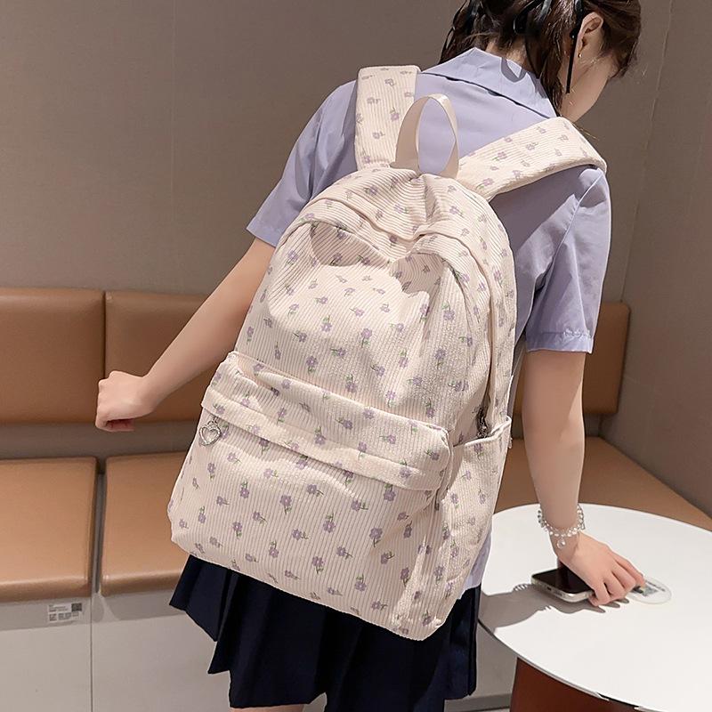 School bag female ins Japanese girls college wind small floral backpack Korean version Harajuku printed middle school student backpack female