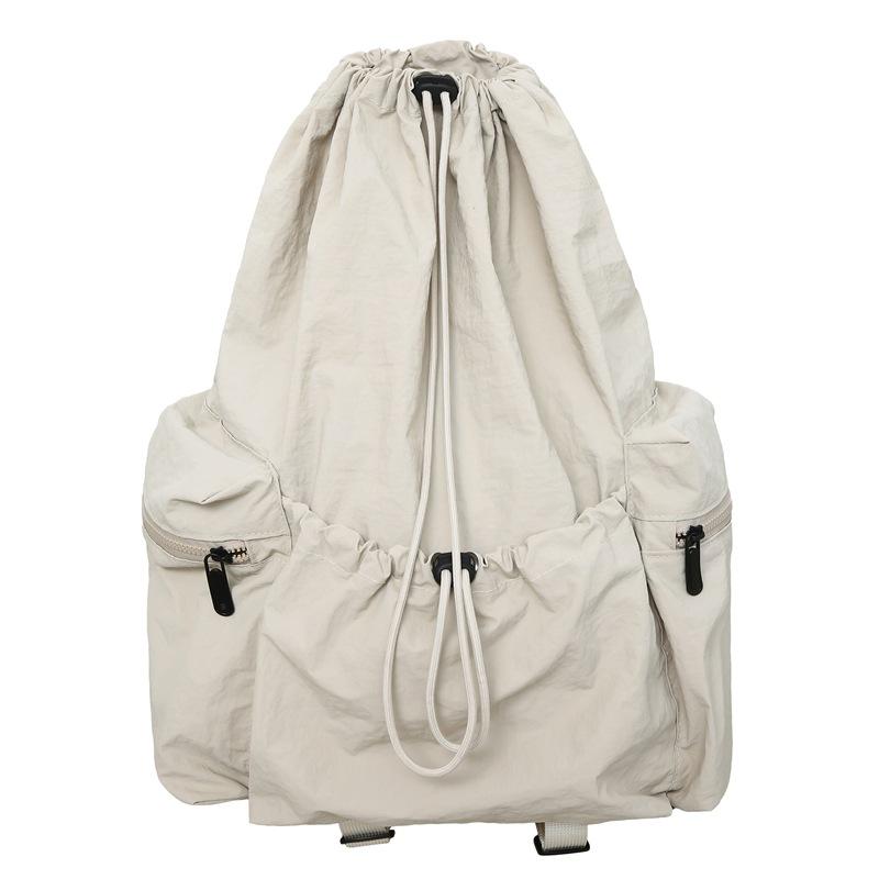 Schoolbag Korean version lazy wind drawstring backpack women's bag 1011 summer new high-value large-capacity lightweight breathable backpack