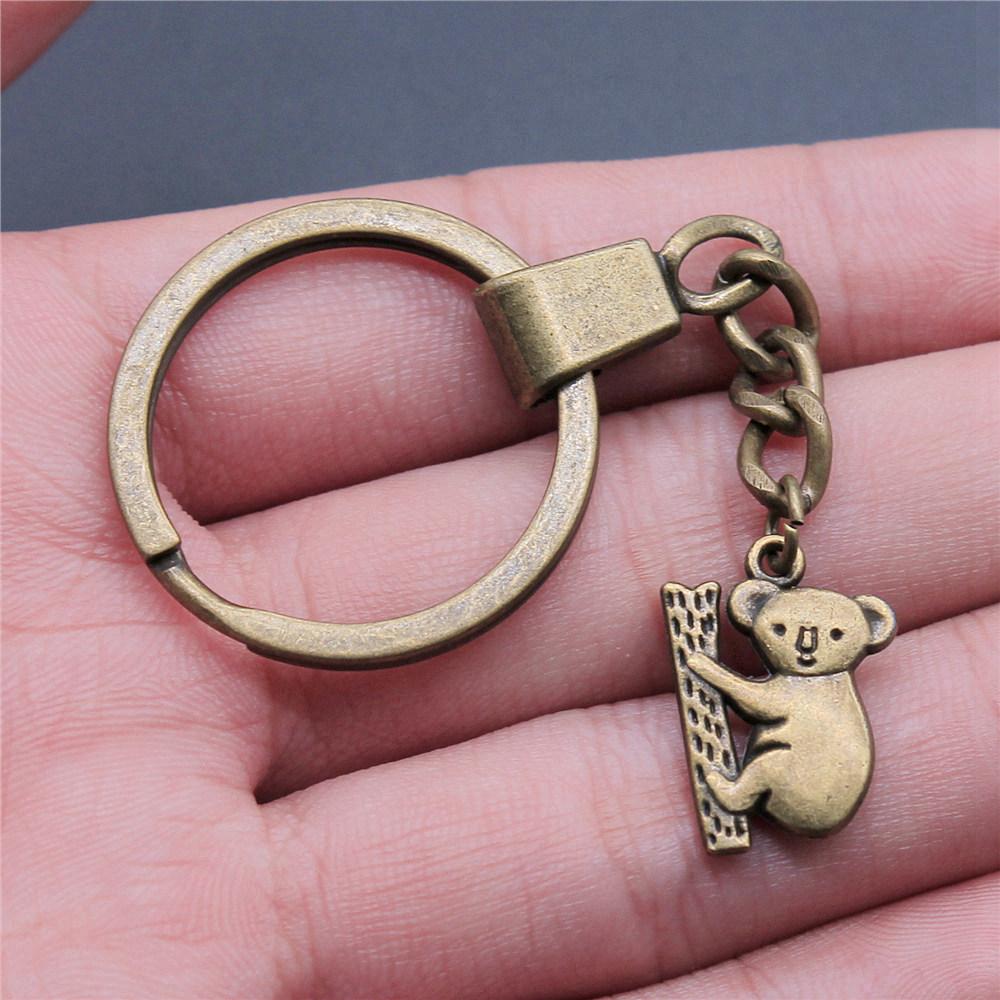 Dinosaur Animal Prehistoric Creature Pendant Antique Bronze Metal Keychain with 30mm Ring for Women High Quality