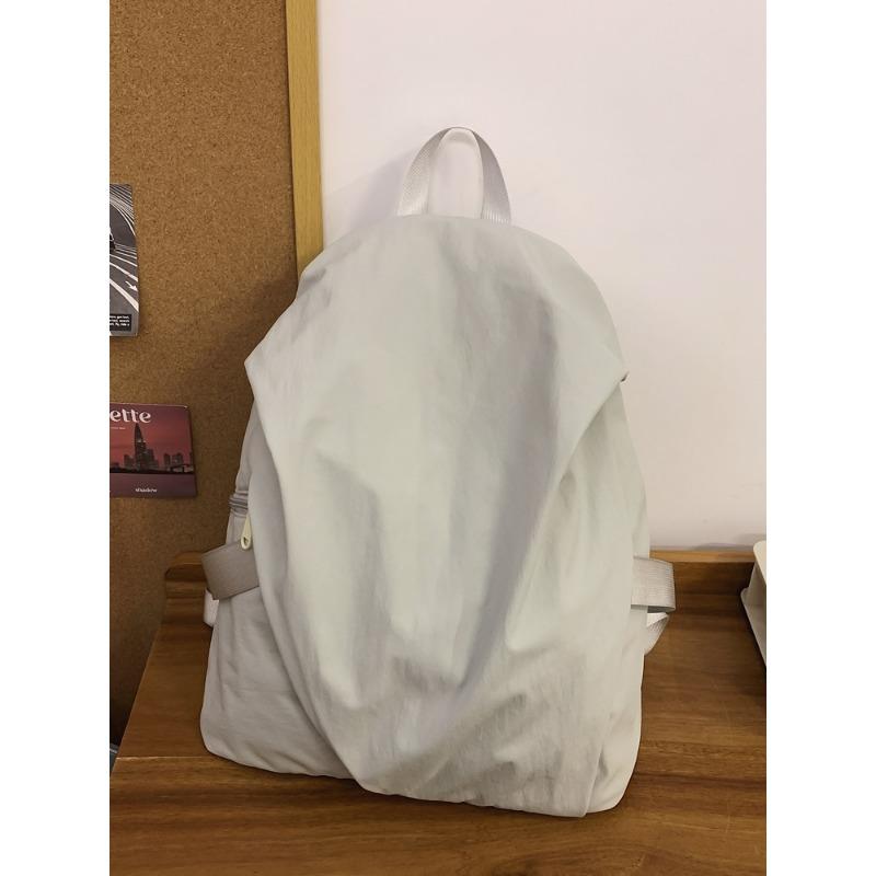 Casual simple and lightweight backpack, student schoolbag, new versatile commuter large-capacity travel backpack