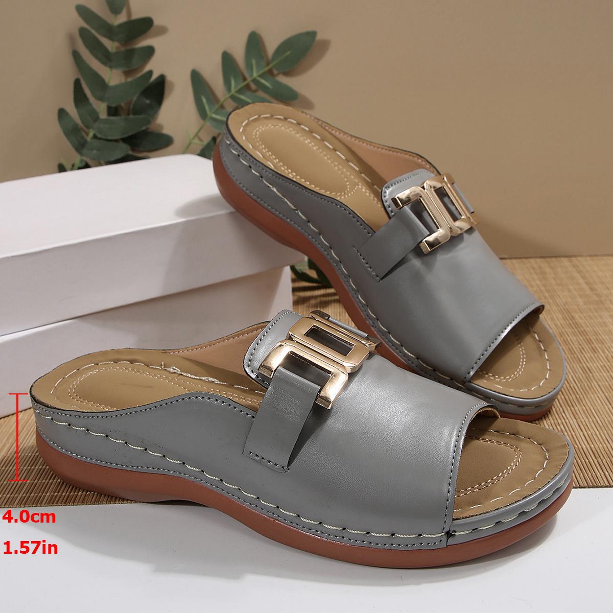 

Foreign trade large size new slope heel thick-soled slippers women s metal decoration one-character Roman style fish mouth beach cool slippers 43 сірий колір