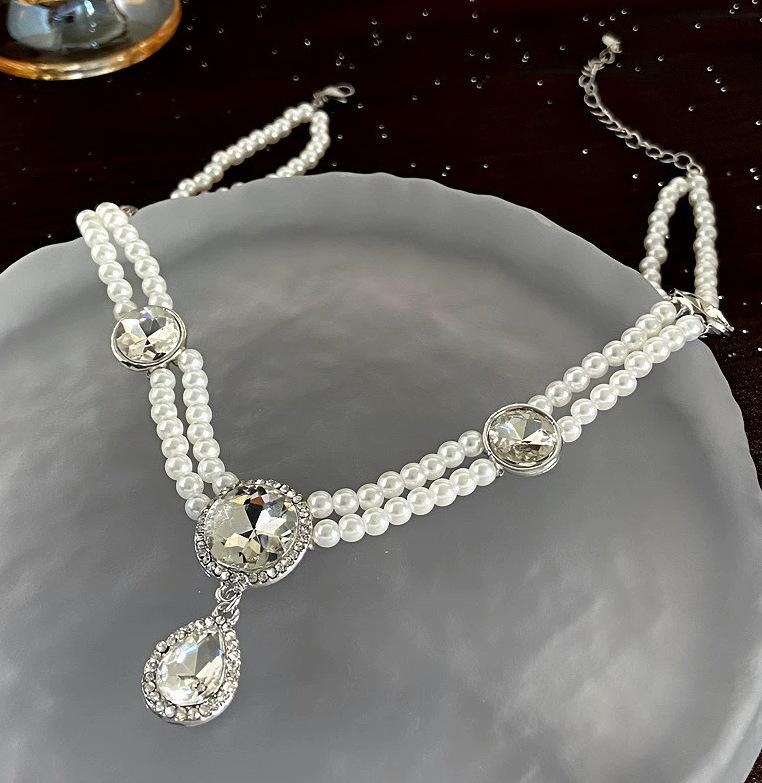 Koreanische Retro-Perlen-Diamant-Fransen-Halskette Internet-Berühmtheit Temperament Designgefühl Blume Schleife Schlüsselbeinkette Halskette weiblich