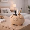 A Container In the Shape of a Plump Beige Pig