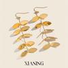 Xia Ling 18K Gold Vacuum-Plated Stainless Steel Leaf Pendant Earrings - European and American Fashion, Fade-Resistant, Versatile Charm for Women.