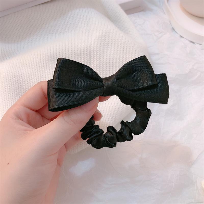 

Princess in Distress Black Bow Hair Tie – New Accessory for High Ponytails & Low Buns чорний