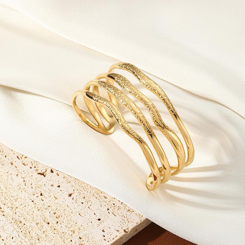 

Hot-selling European and American wide-edge stainless steel bracelet electroplated K gold titanium steel bracelet personalized retro women s versatile