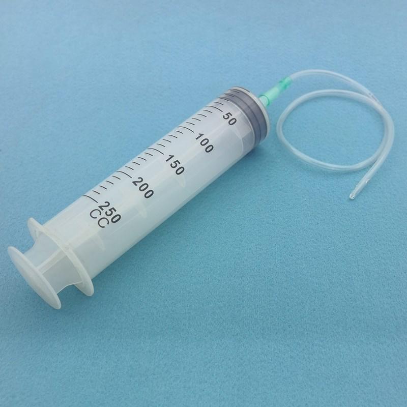 High-Capacity Flushing Syringe with Coarse Needle for Glue or Enema