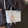 New High-end Korean Version Hugh Simple Portable Bucket Bag Versatile Commuter Fashion Niche Messenger Bag Bag Woman