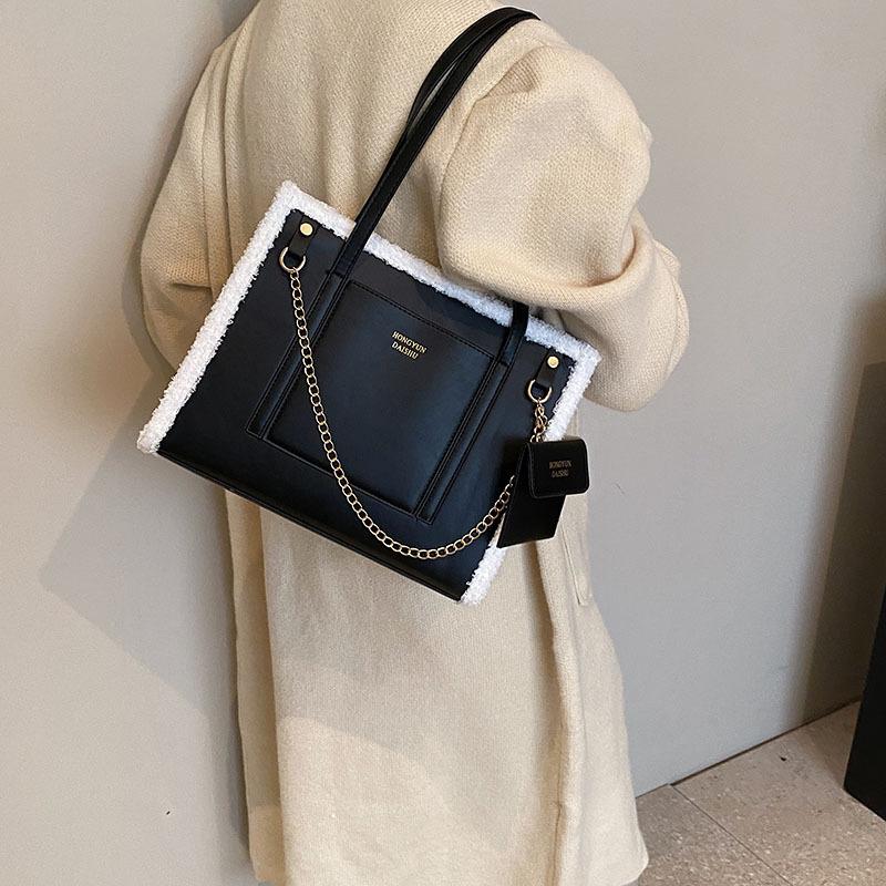 Niche lamb wool handbag women's 2025 new high-end shoulder bag large-capacity commuter tote mother and child bag