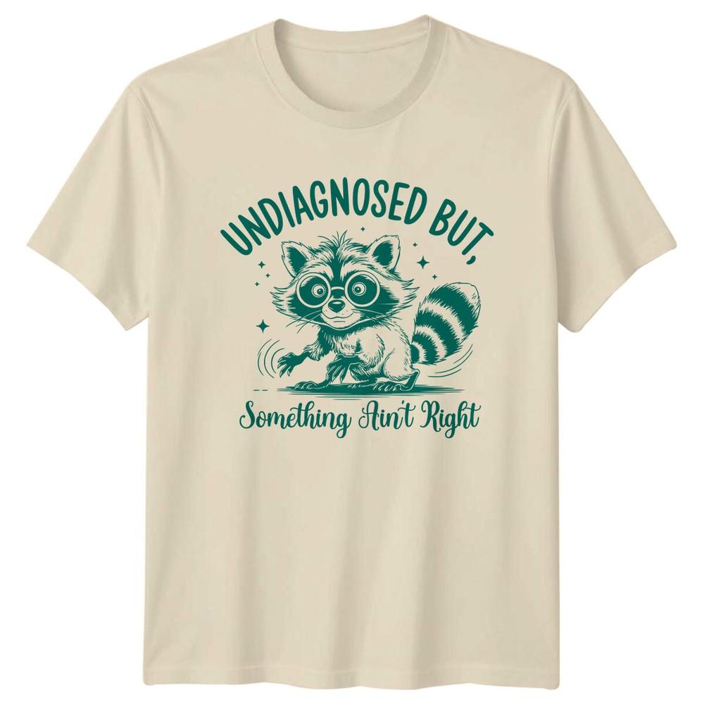 Funny Raccoon #034;Undiagnosed But Something Ain#039;t Right#034; Sarcastic TShirt Unisex T-Shirt M