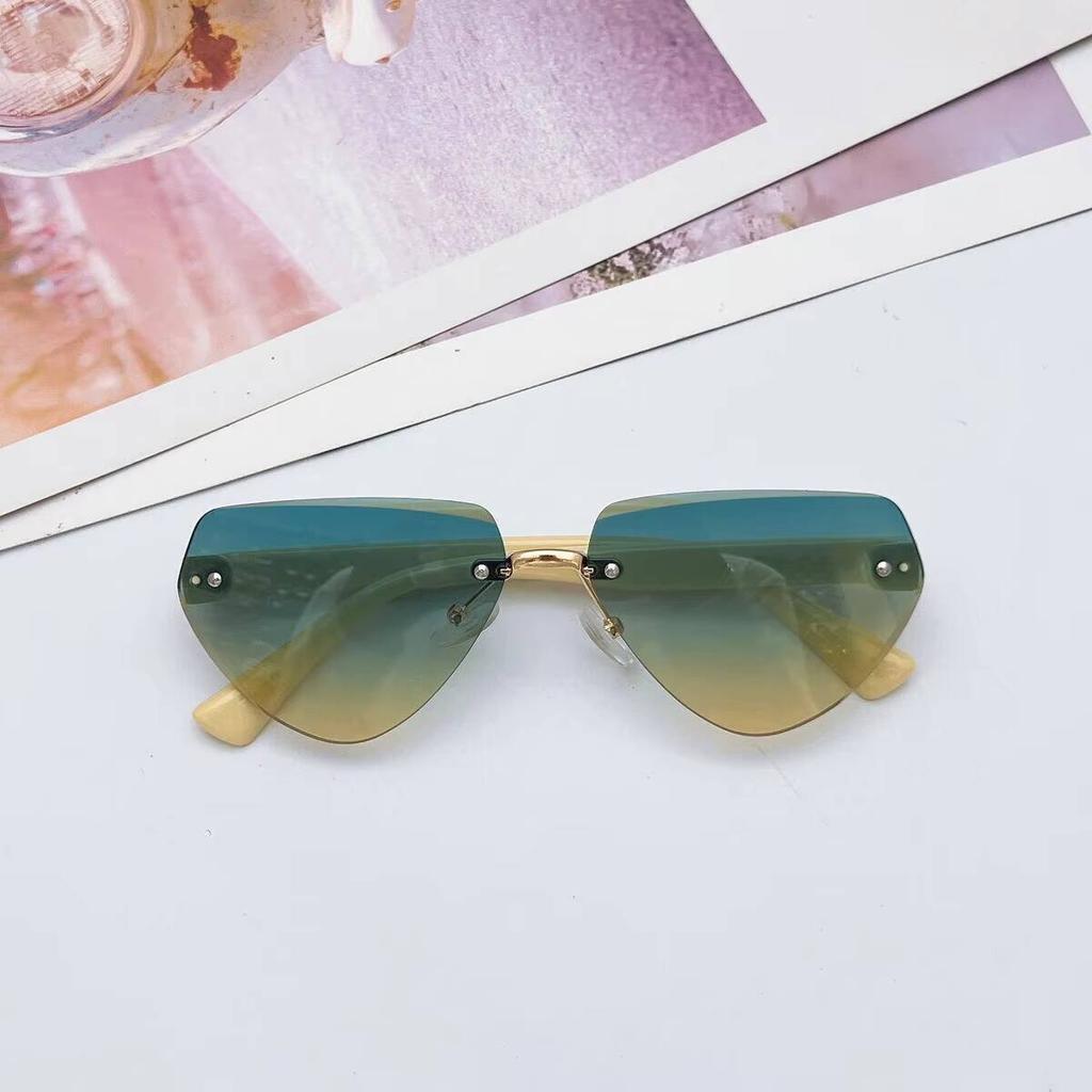 2026 New Children's Fashion Frameless Irregular Personality Trend Dopamine Color Ocean Lens Sunglasses