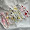Bowknot Phone Lanyard Short Female Cute Peach Heart Colored Beaded Phone Shell Pendant Accessories Package Decoration