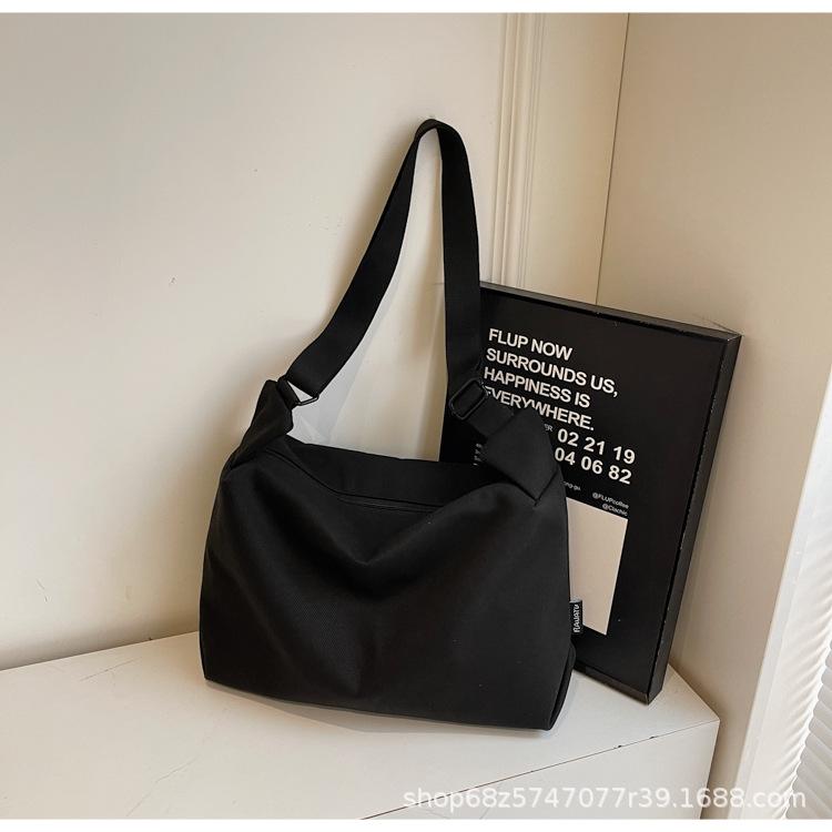 2025 New Canvas Casual Large Capacity Commuter Bag Women's One Shoulder Crossbody Bag Women's Bag Fashionable Versatile Tote Bag