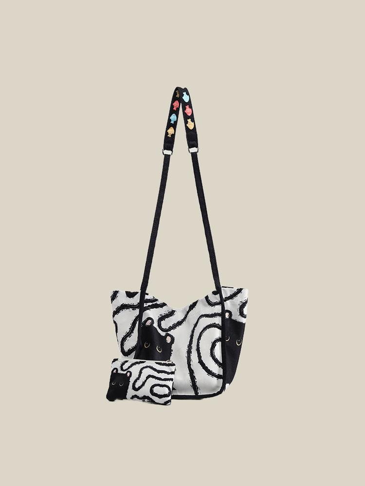 

Niche bag women s 2025 new cute cartoon graffiti bucket canvas bag high-end and versatile one-shoulder crossbody bag