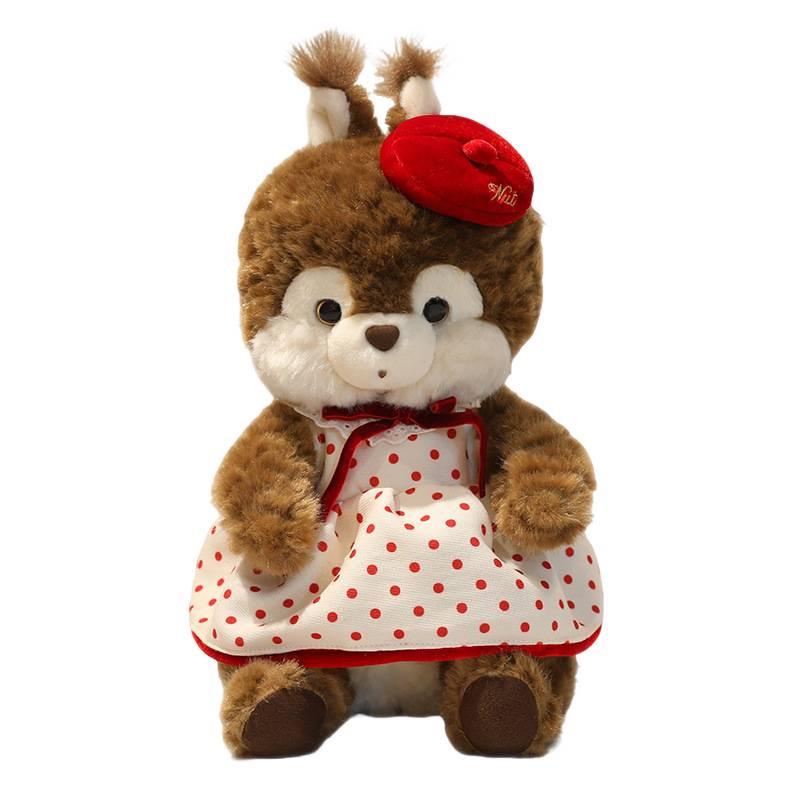 Entzückendes Haselnuss-Kakao-Eichhörnchen-Stofftier mit gepunktetem Rock - Perfekter Schlafbegleiter für Kinder.