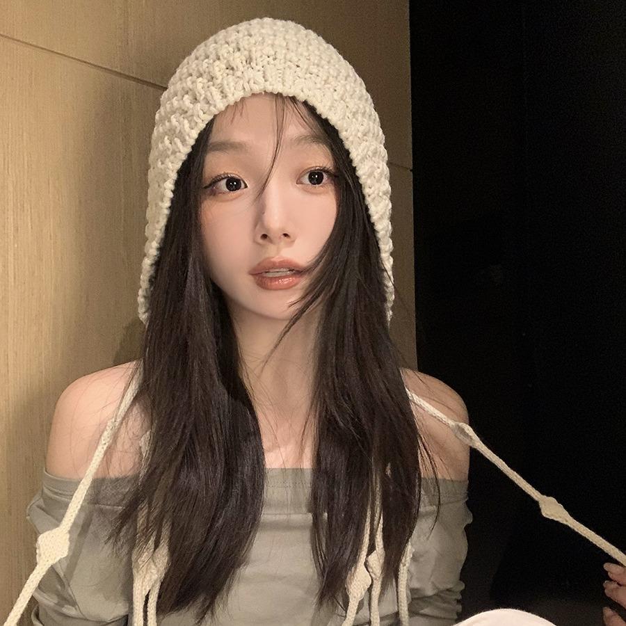 Hand-woven fringed knitted hat women's winter new wool knitted hat hollow ear protector warm Lei Feng hat