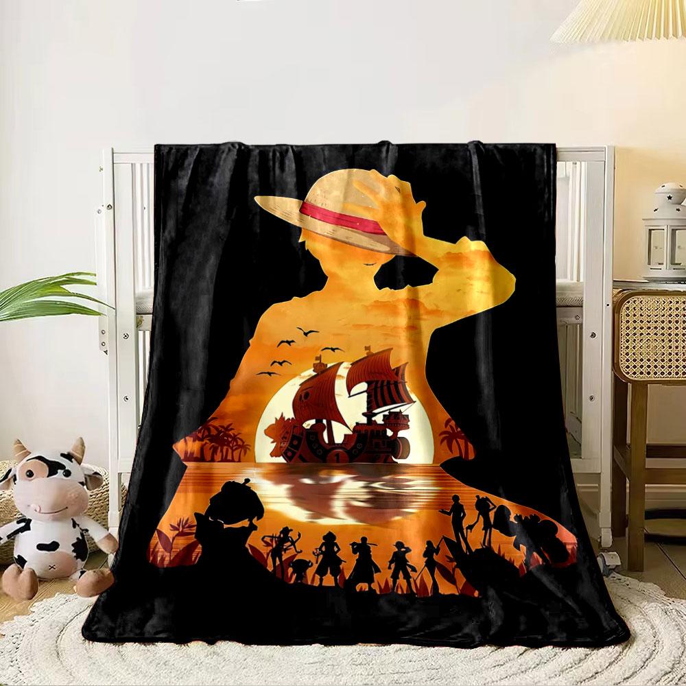 Silhouette of a figure with a straw hat, ship, crew, and sunset scene. for all seasons blanket lunch break throw gift 80cm x 120cm