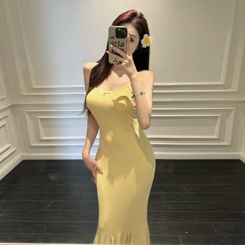 Pure desire yellow vest suspender dress women's summer 2026 thin shoulder straps waist and thin temperament fishtail medium and long dress