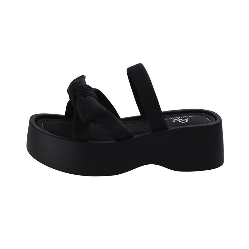 Bow one-word thick-soled slippers for women's summer wear 2025 new white heightening skirt cool slippers