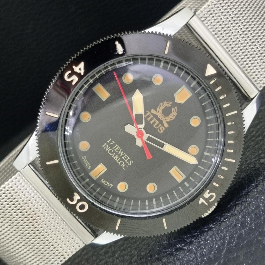 

ВИНТАЖНЫЕ ШВЕЙЦАРСКИЕ МУЖСКИЕ ЧАСЫ TITUS С РУЧНЫМ ЗАВОДОМ, ВРАЩАЮЩИМСЯ БЕЗЕЛЕМ, ЧЕРНЫМ ЦИФЕРБЛАТОМ a700248-5 R202-a700248